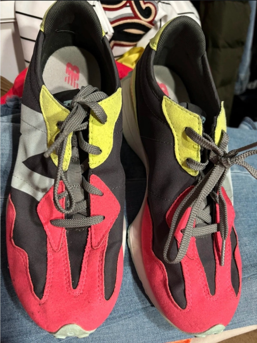 New Balance Black Sneakers with Pink and Yellow Accents